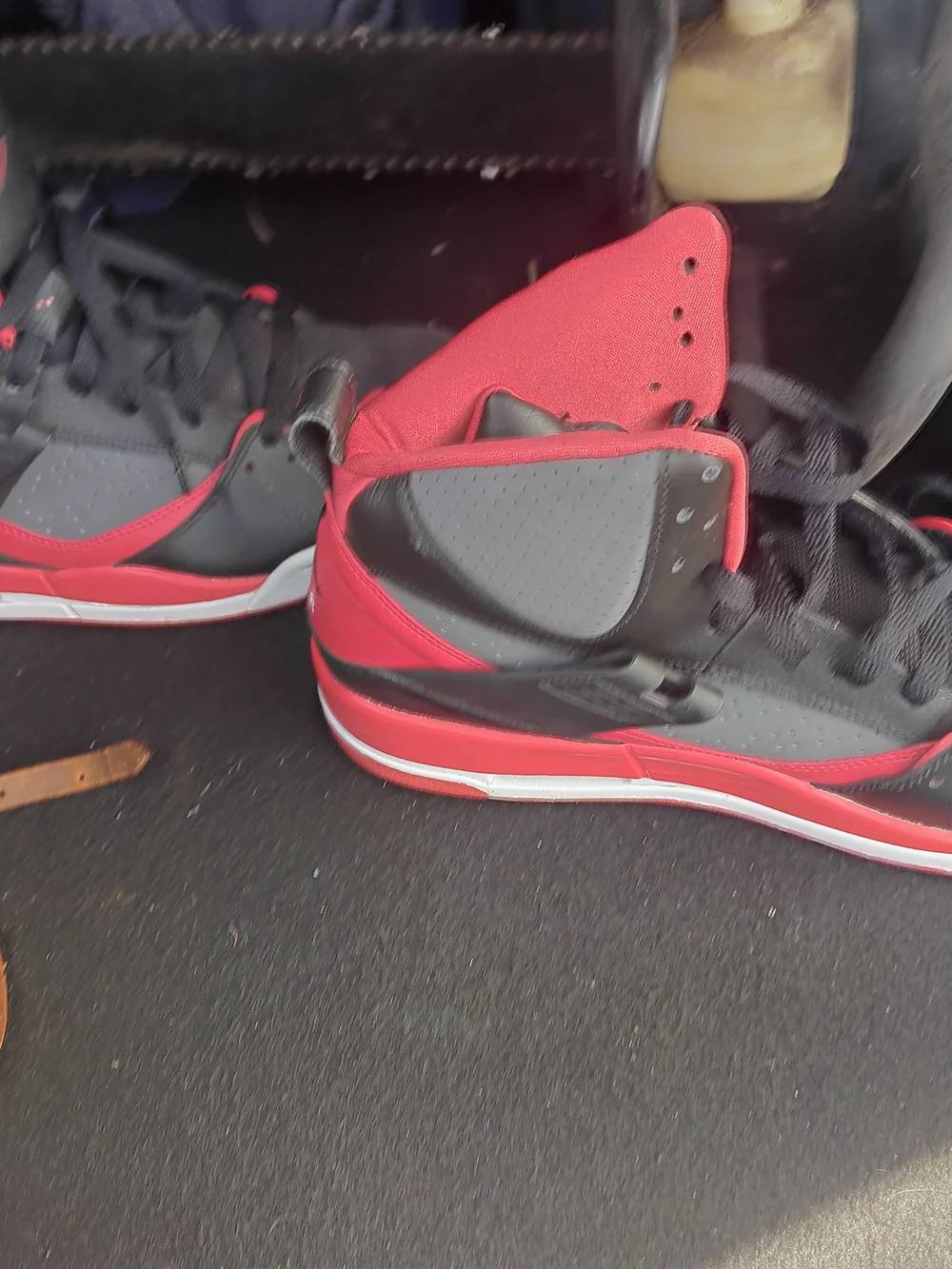 Nike Jordan and Red High-Top Sneakers